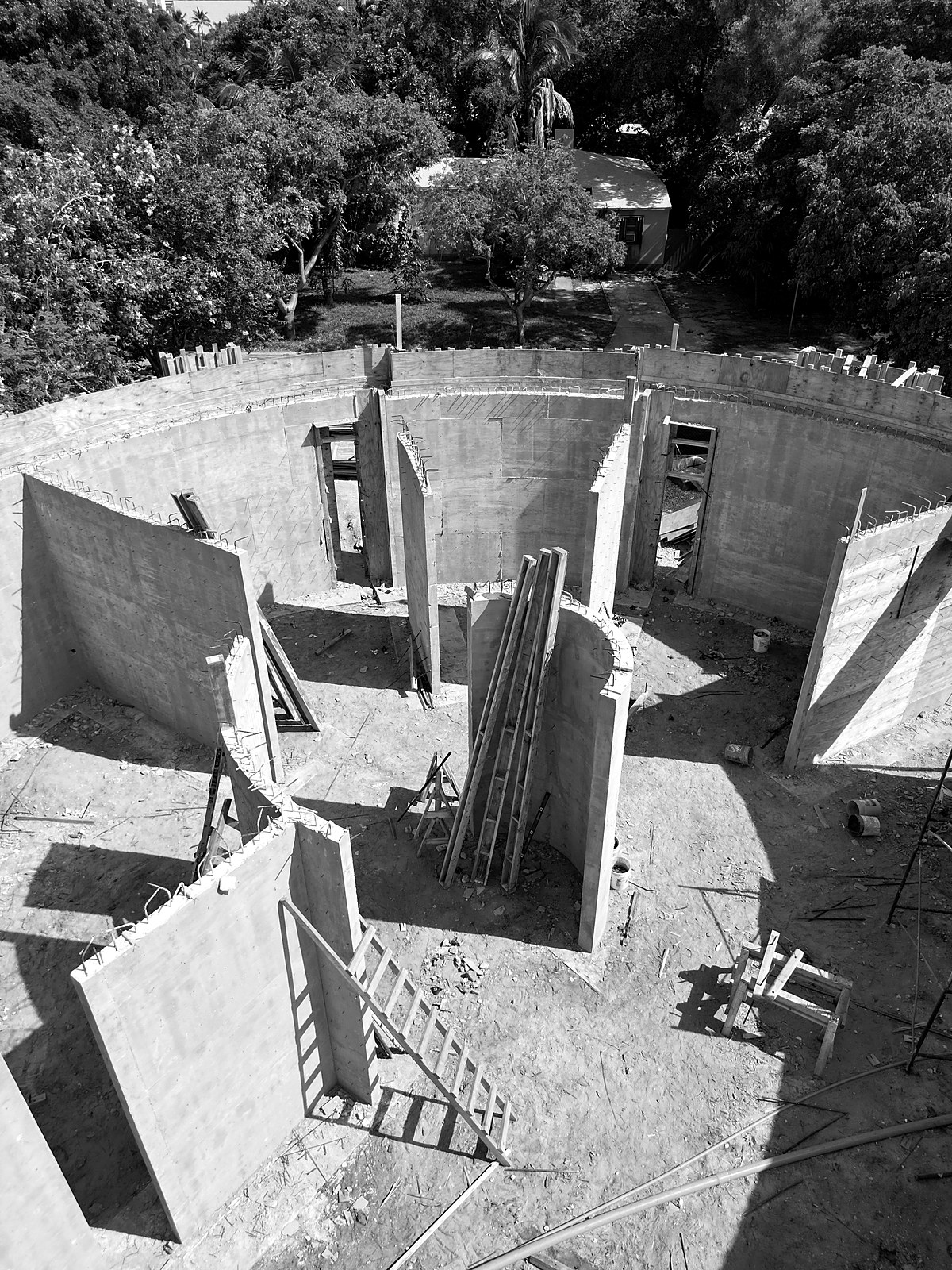 211 — interior court and radial concrete walls, June 2026