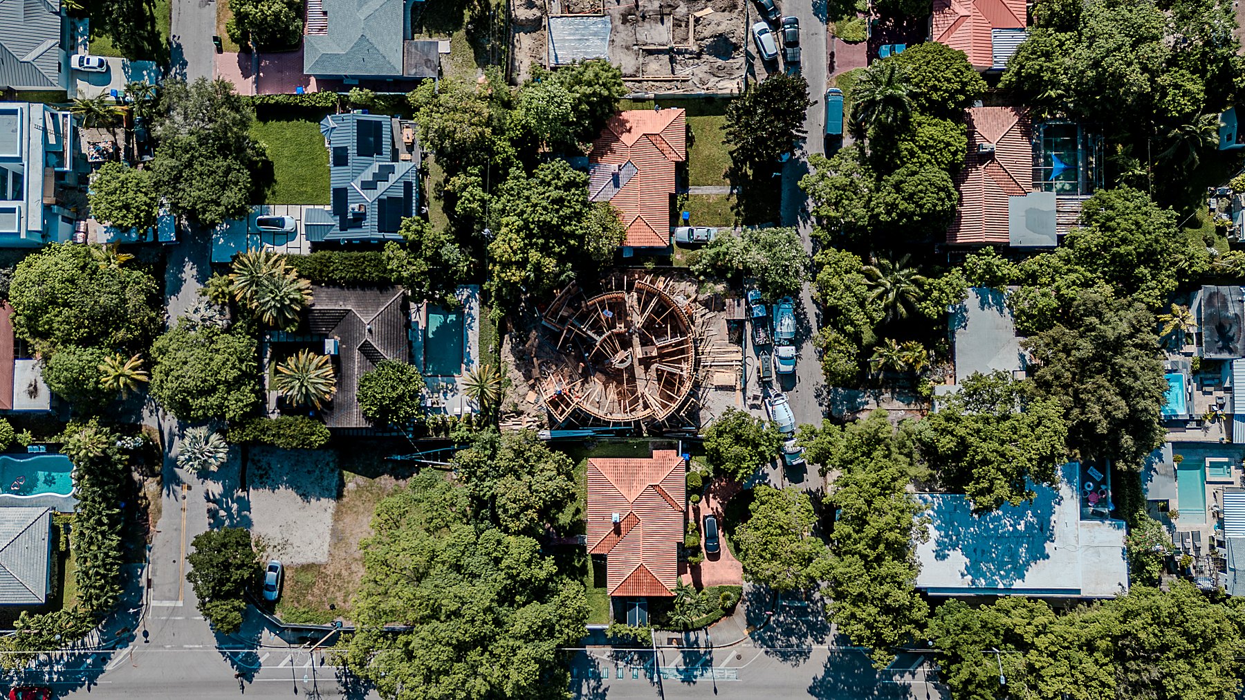 211 — the circular house in its Buena Vista neighborhood, aerial, June 2026