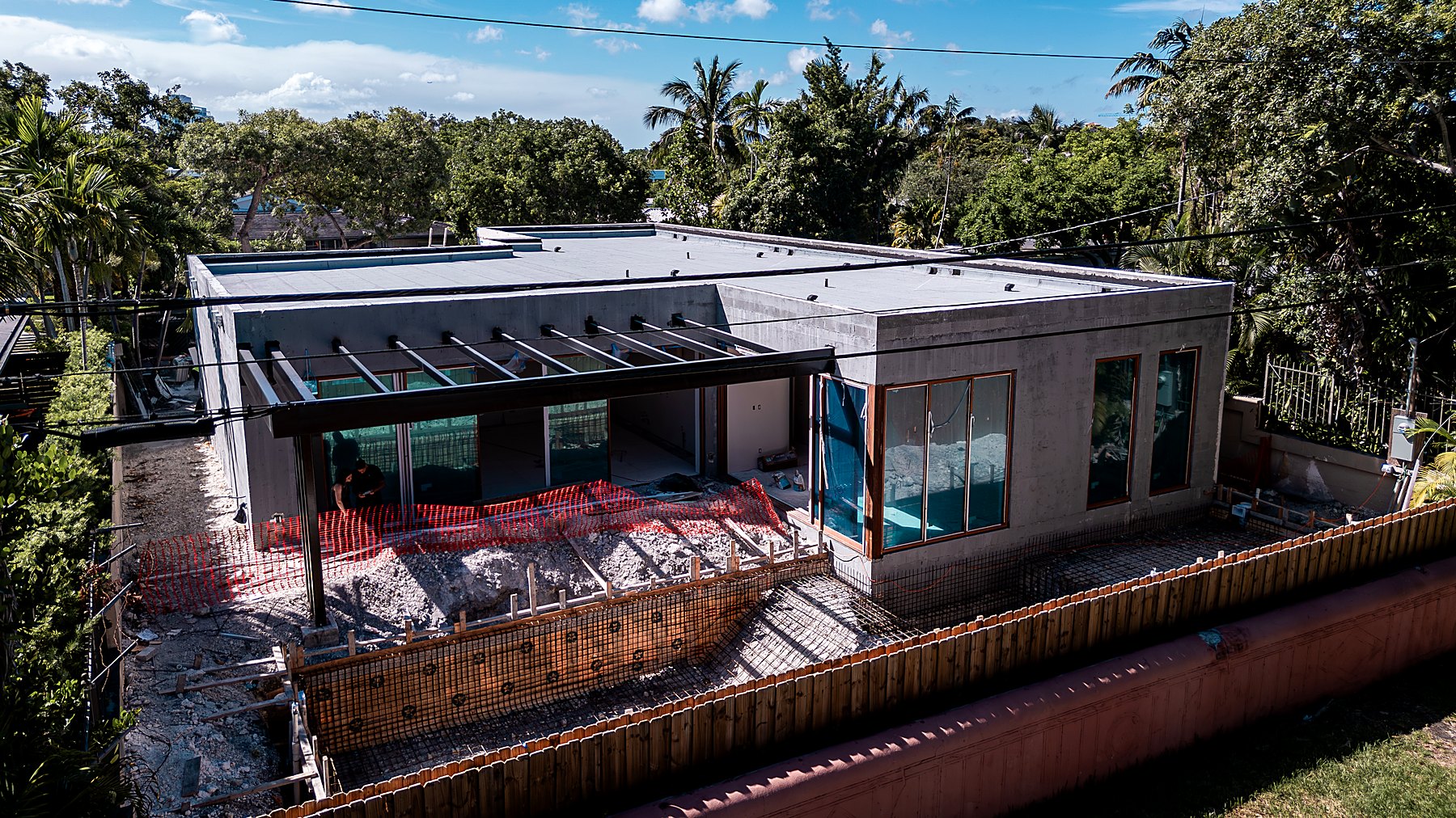 285 — roof, glazing and pool terrace under construction, June 2026
